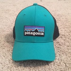 A teal Patagonia baseball cap